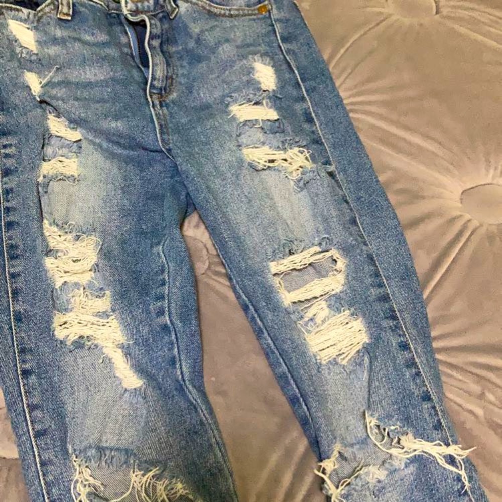 Blue mamba distressed jeans.